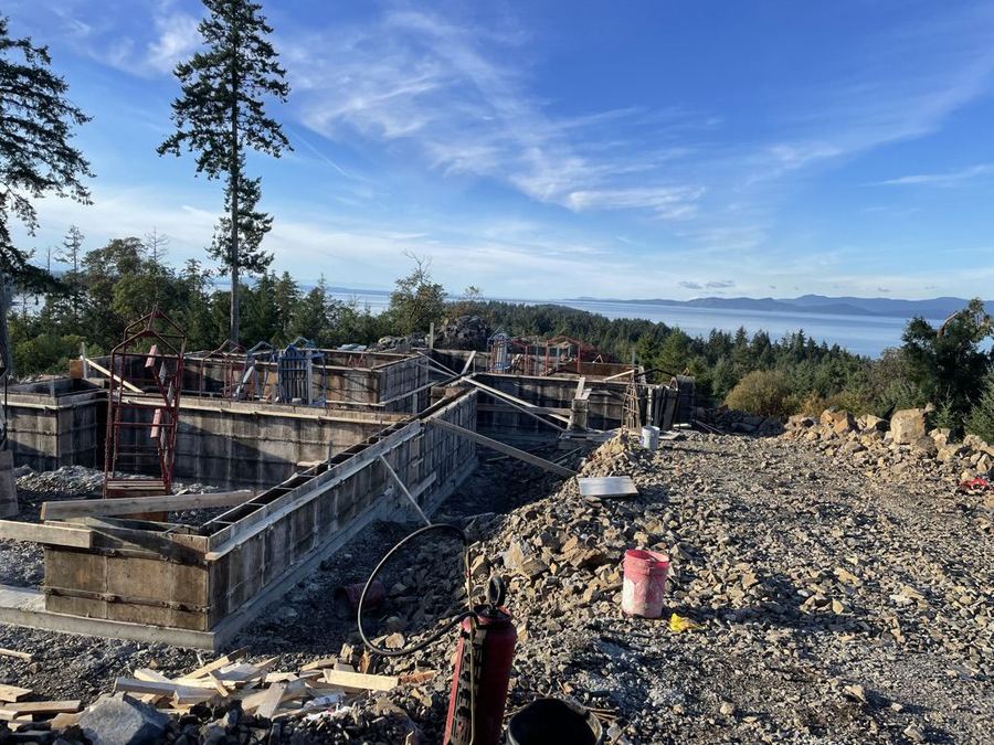 Custom home exterior in the early framing stages